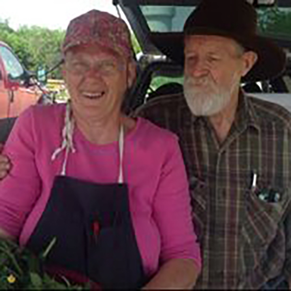 Adams ORAC Farmers showing their produce off at a farmer Adams ORAC Farmers showing their produce off at a farmer's market.