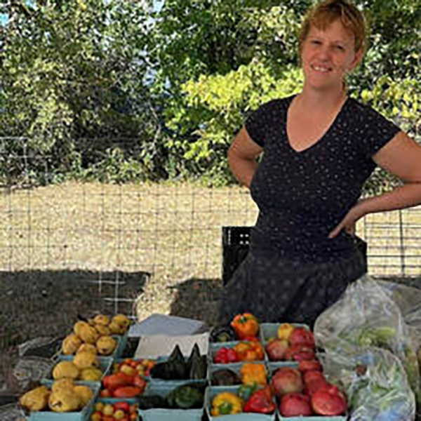 Bread and Roses Farm produce displayed on a table Bread and Roses Farm produce displayed on a table