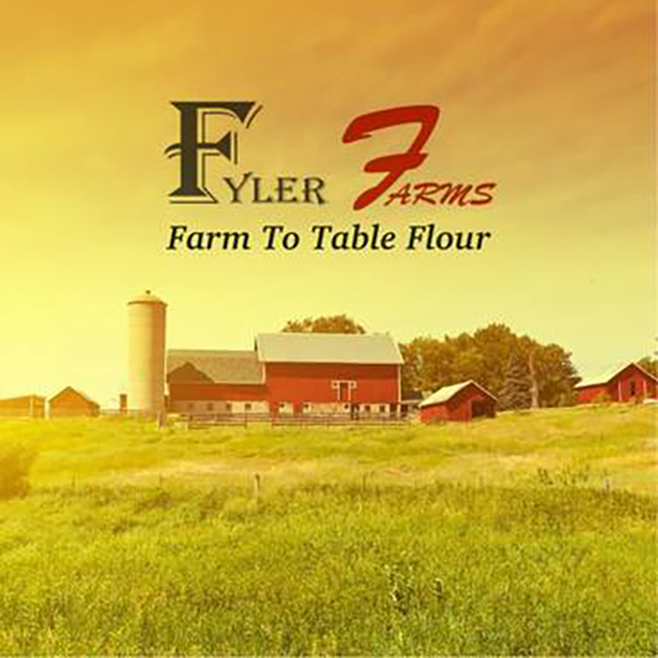 Official logo of Fyler Farms superimposed on an image of a red barn Official logo of Fyler Farms superimposed on an image of a red barn